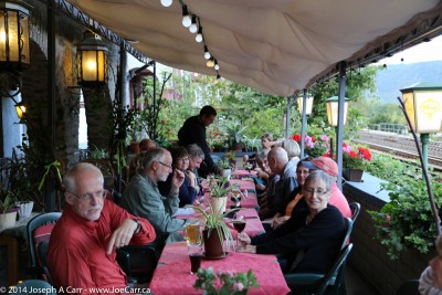 Our group having pre-dinner drinks on the patio few metres from the train tracks at Hotel Kranenturm