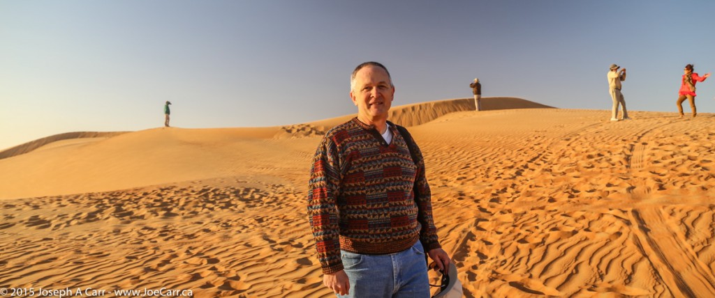 Joe on the sand dunes at sunrise near Liwa Oasis, Abu Dhabi, UAE