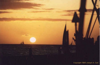 Sunset from the Royal Hawaiian's patio, looking out over Waikiki Beach