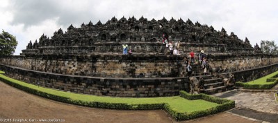 Hundreds of Buddha statues looking back to the Borobudur temple Java, Indonesia