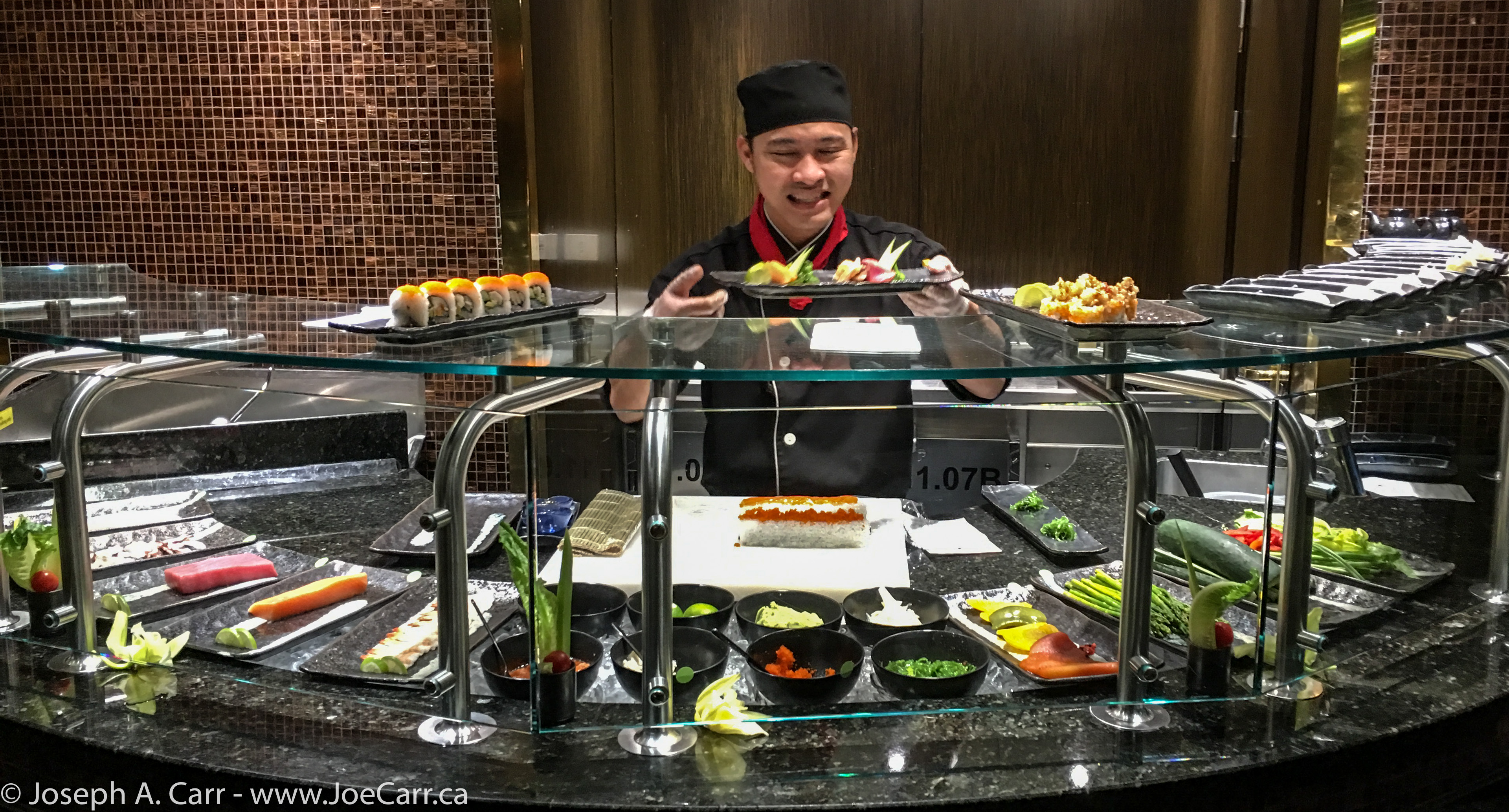 Sushi chef displaying his work in the Tamarind restaurant
