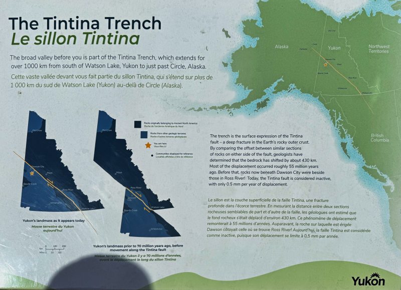 The Tintina Fault runs from Circle, Alaska to Watson Lake, Yukon. The SW corner of Yukon landmass shifted 1,000 km 55 million years ago. Yukon government information sign at Gravel Lake.